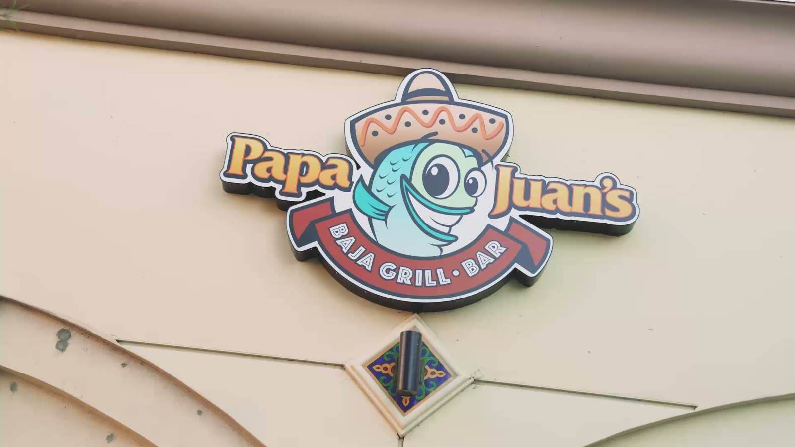 The Papa Juan's Baja Grill & Bar sign above the entrance in Northridge