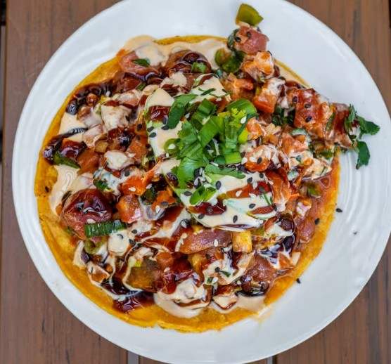 Tuna tostada with chipotle crema and sesame